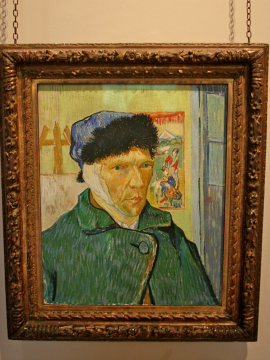A photo of the Van Gogh self potrait with a bandaged ear.
